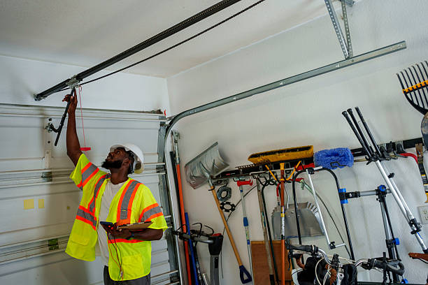 Professional Garage Door Panel Replacement technician working in Belen, NM